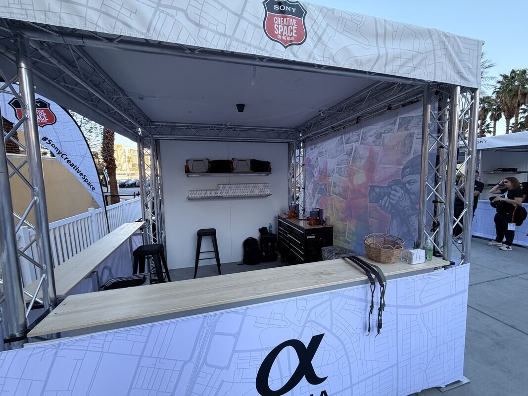 Truss and counter booth build-out staged before an event opens